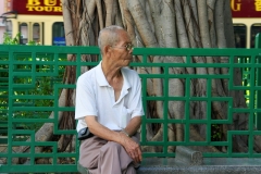 Hong Kong oude man en oude boom